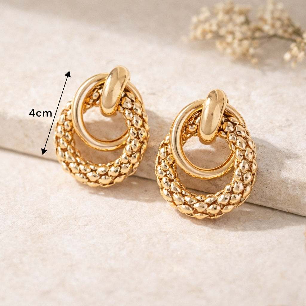 Boucles d’oreilles pendantes dorées statement pour femme, look soirée chic