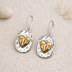 Boucles d’oreilles cœur argent et doré pendantes effet martelé