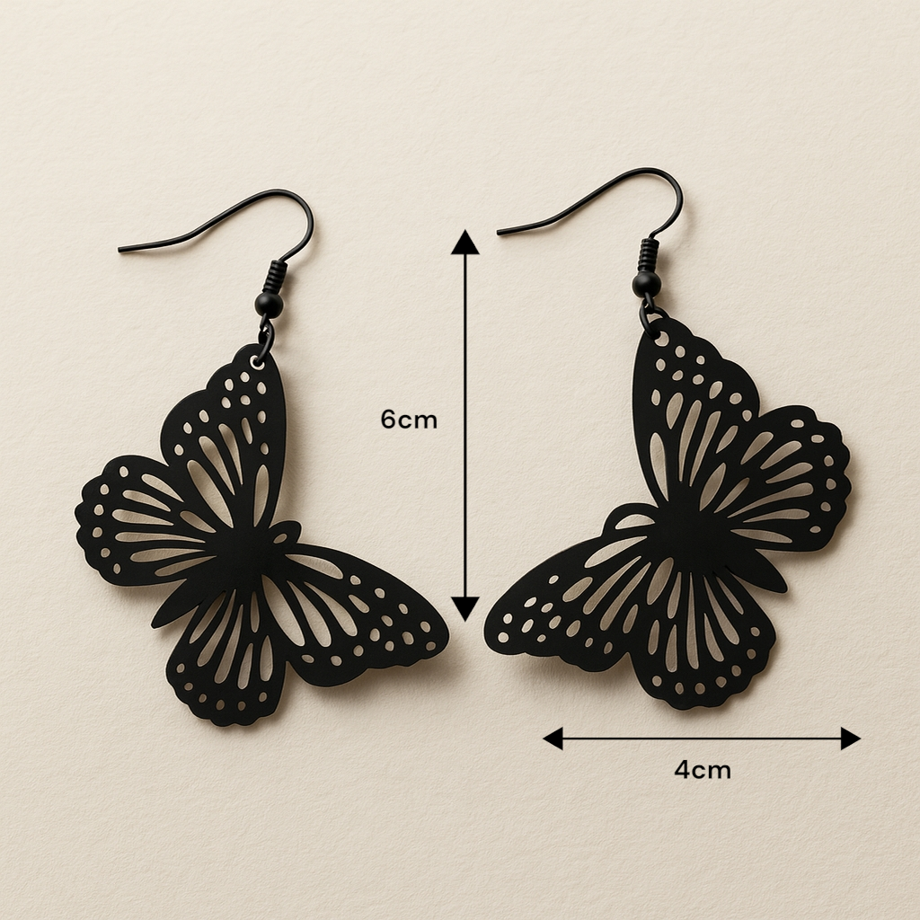 Boucles d'oreilles papillon noires portées pour un look élégant et moderne