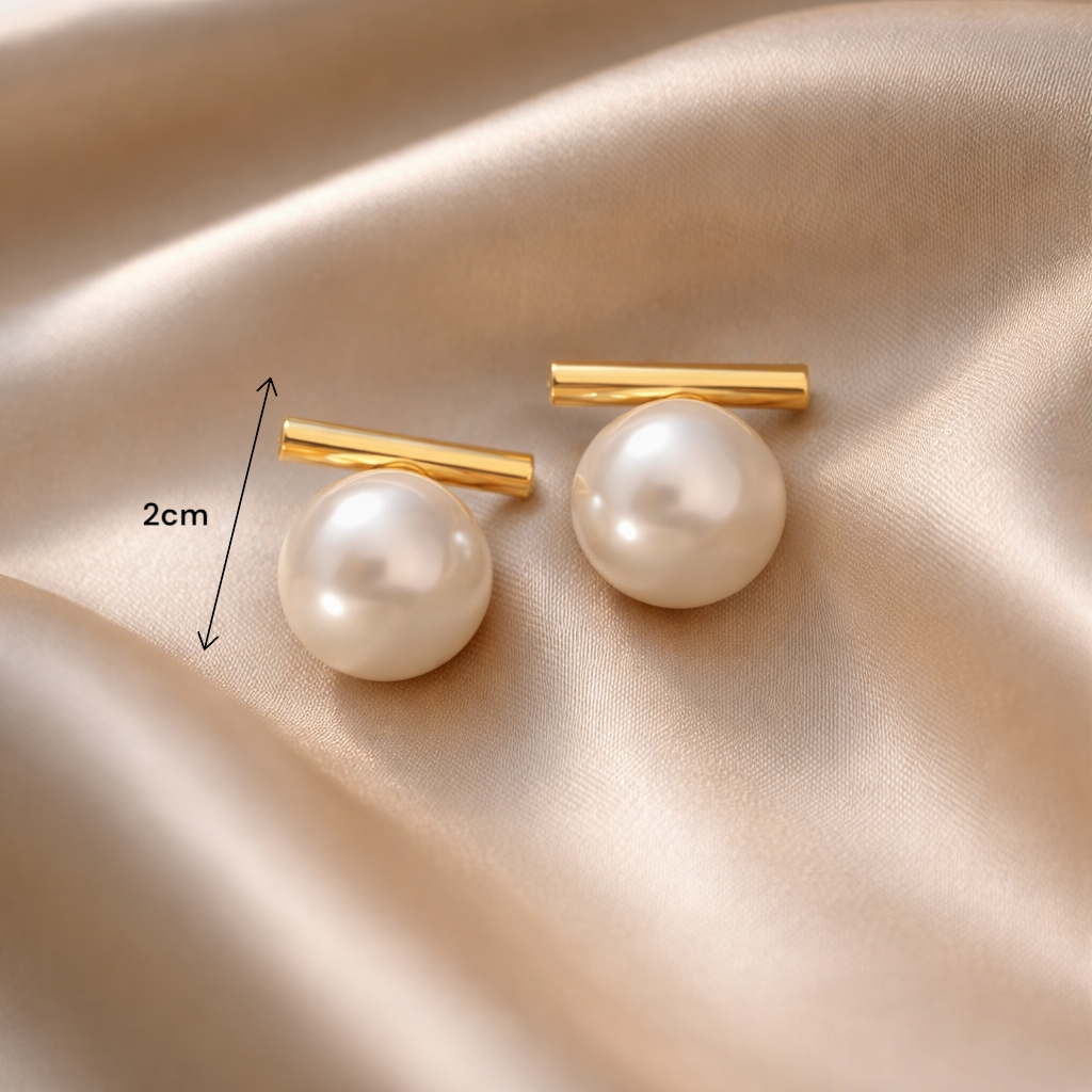 Boucles d’oreilles perle blanche chic à porter au bureau ou en soirée