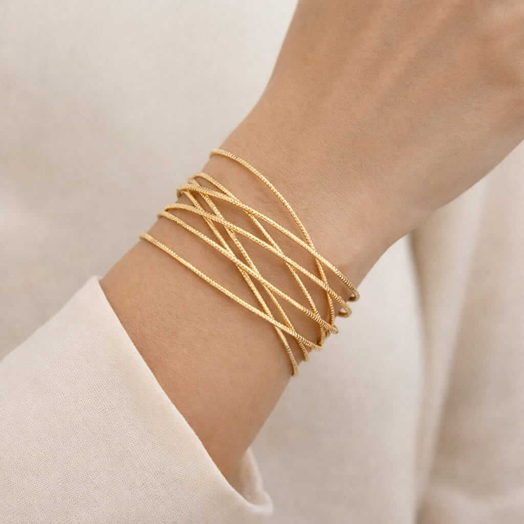 Bracelet manchette ouvert doré femme multi rangs design minimaliste