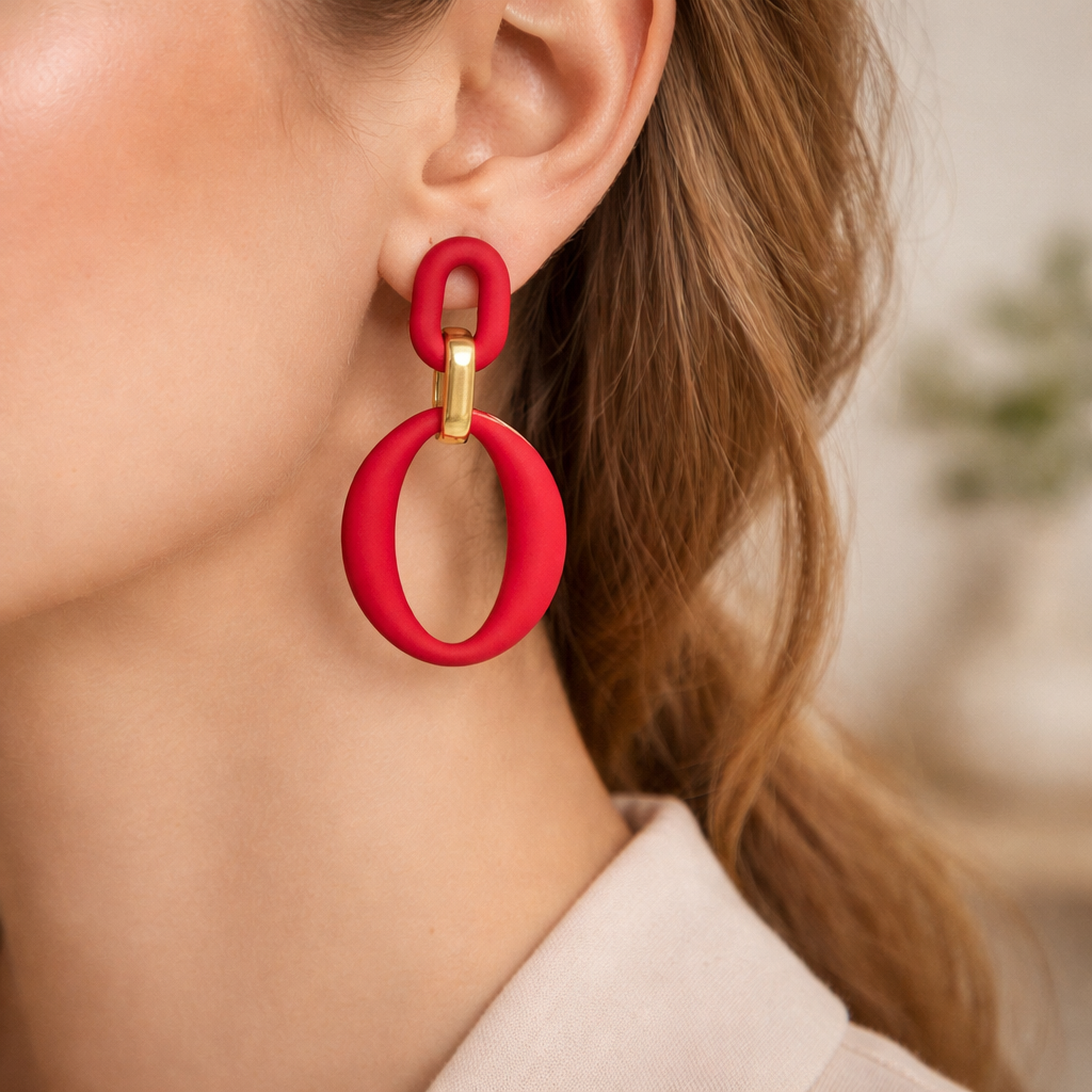 Boucles d'oreilles ovales rouges femme avec détail doré design moderne