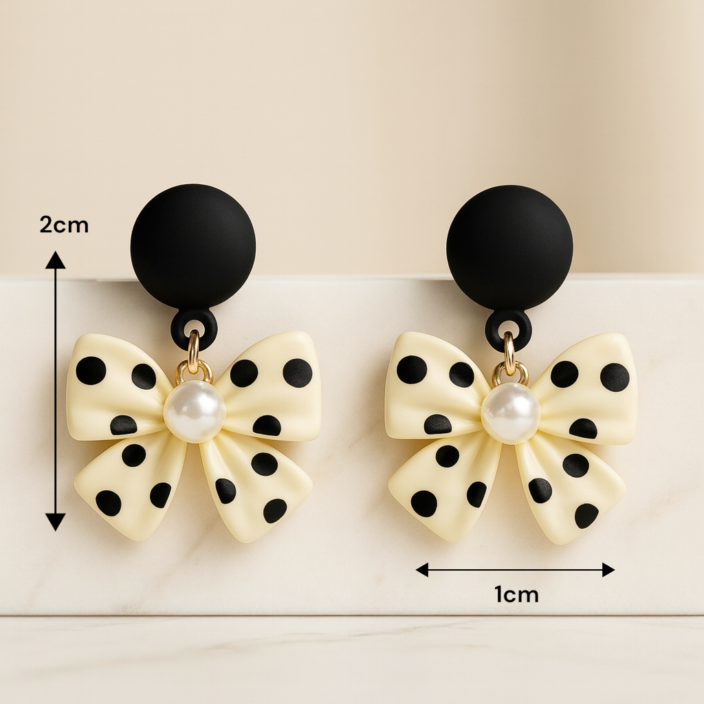 Boucles d’oreilles nœud à pois portées, accessoire rétro chic pour tenue femme