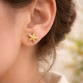 Boucles d'oreilles étoile de mer dorées acier inoxydable clous 1 cm