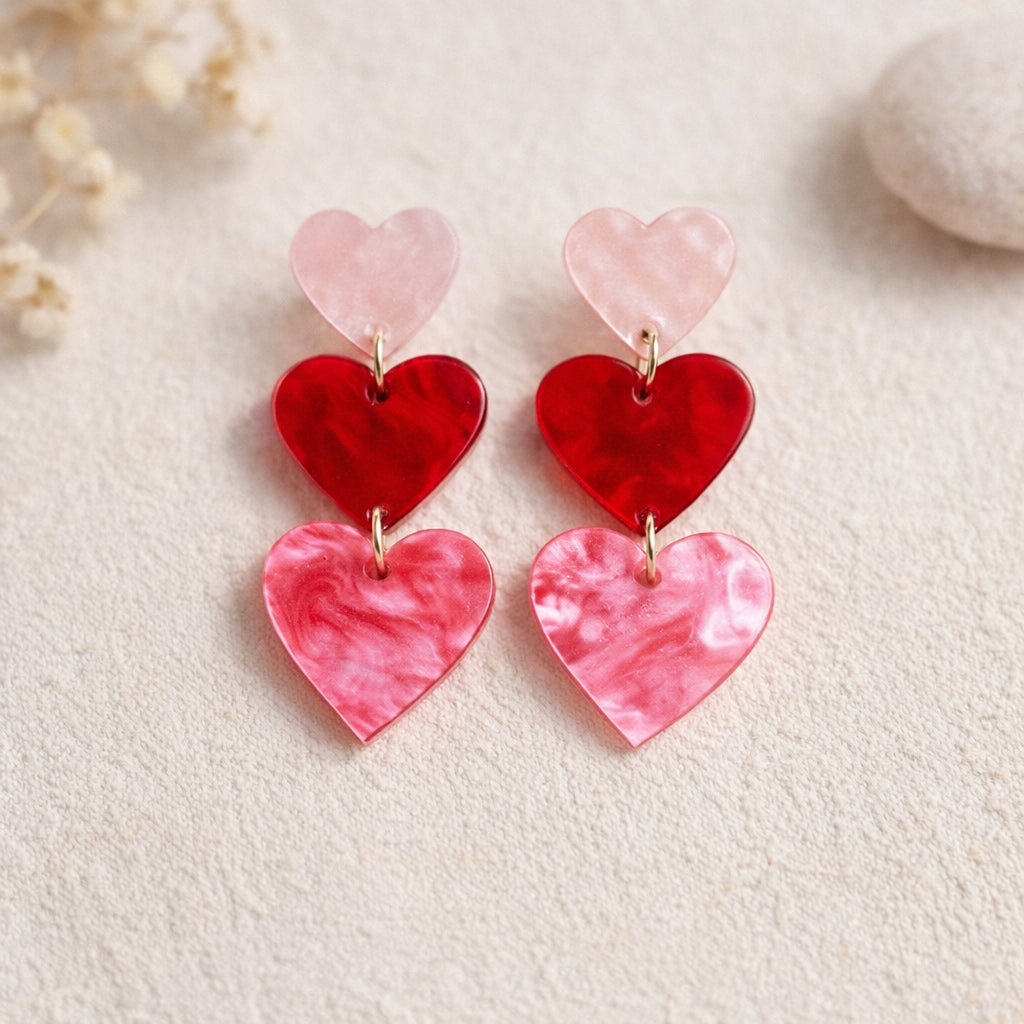 Boucles d’oreilles cœurs pendantes rose et rouge à trois cœurs superposés
