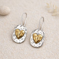 Boucles d’oreilles cœur argent et doré pendantes effet martelé