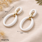 Boucles d’oreilles longues blanches chic à porter au quotidien ou en soirée