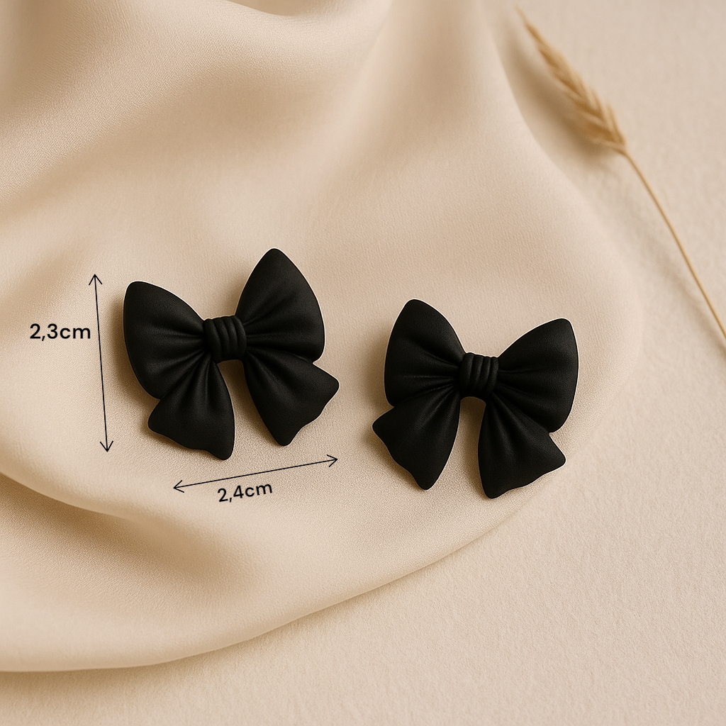Puces nœud noir sur femme, bijou chic pour tenue de soirée ou bureau